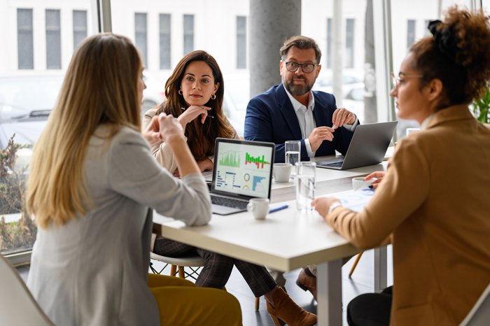 lawtistic-attorney-lawyers-meeting Happy therapist woman portrait and checklist for counselling, help and clipboard for support in office. Promoting marketing for therapists.